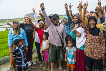 May Boeve, founder of 350.org - a non-profit organization focus on climate change from US, with local communities who sufferring from coal power plants in Mekarsari village, Indramayu regency, West Java province on 25 January 2017. "Agriculture productivity gets lower and unemployments are everywhere since productive lands got evicted, the dust from the coal also give bad impact to the locals' health," said locals. Photo by Ardiles Rante for 350.org