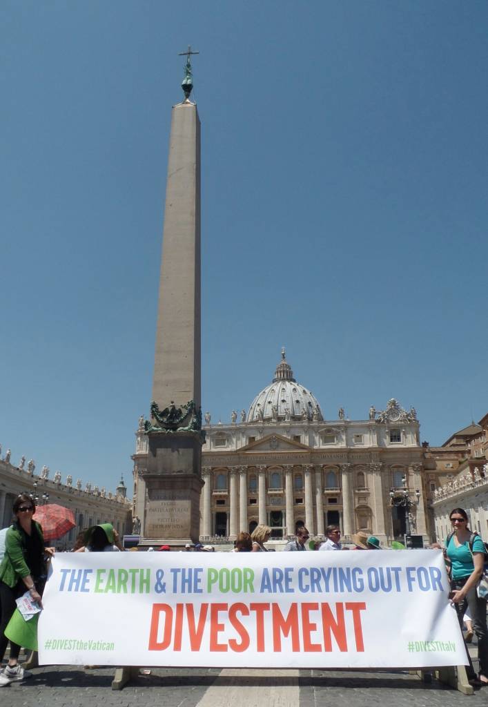 Divest the Vatican banner