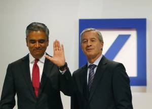 co-CEOs of Deutsche Bank sheepishly acknowledging the divestment movement